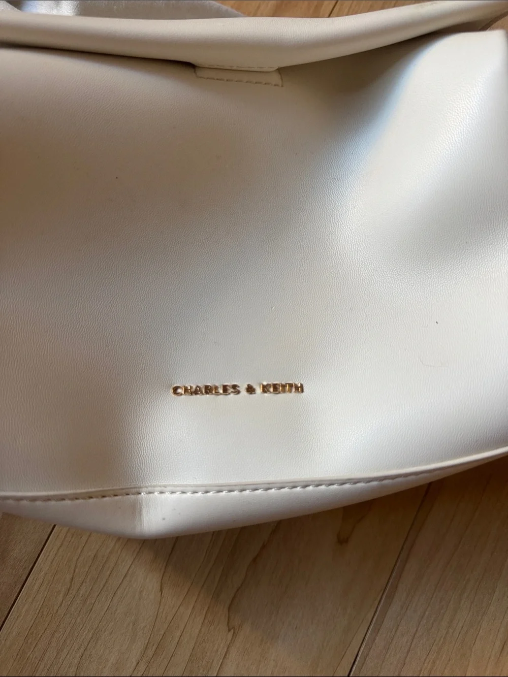 Charles & Keith Cream Knot-Handle Shoulder Bag with Charm
